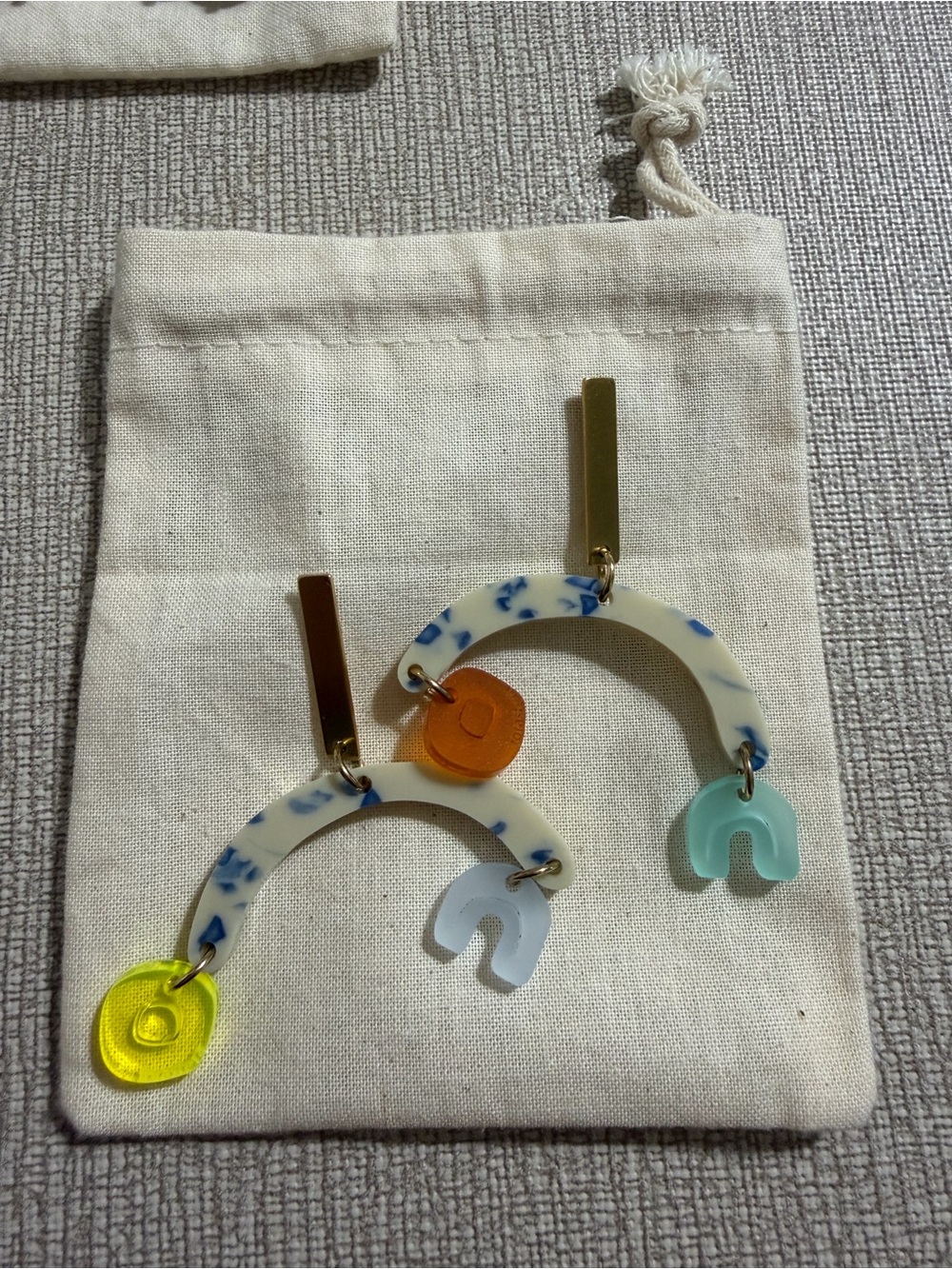 Porcelain-Patterned Ivory Arch Earrings with Blue Speckle and Multicolor Charms